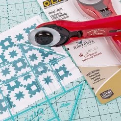 Lori Holt Red Olfa 45mm Quick Change Rotary CutterOlfa With Lori Holt Of Bee In My Bonnet Co. #RTY-2C-RED -Fabric Sewing Store rb olfa beeinmybonnetrotarycutter sm3